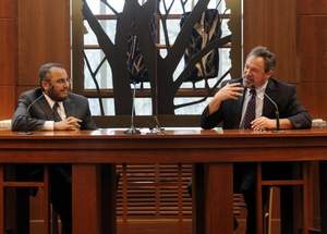 Imam Ossama Bohloul of the Islamic Center of Murfreesboro, left, listens to Rabbi Mark Schiftan of Temple Congregation Ohabai Sholom during a discussion Sunday. / Sanford Myers / The Tennessean