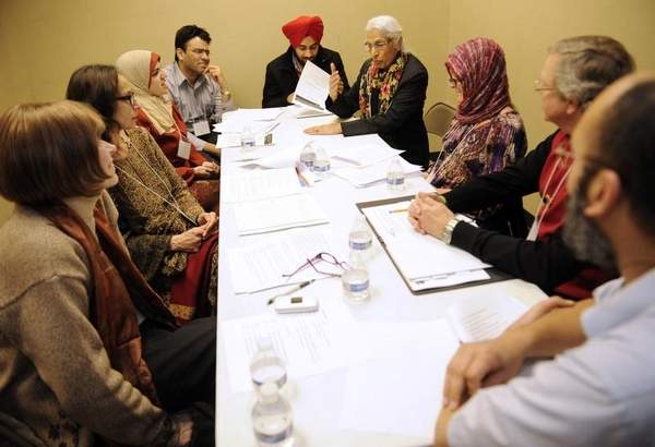 The scripture dialogue circle with St. Paul's Episcopal, the Islamic Center of Williamson County and Nashville Sikh Gurdwara discuss scripture on Sunday at the Islamic Center of Williamson County in Franklin. Sanford Myers / The Tennessean